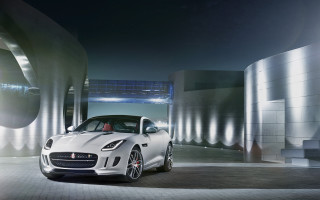White car night building lights - a white car free wallpaper for desktop