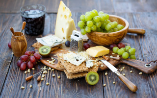 Wooden table cheese grapes wine - a wooden table free wallpaper