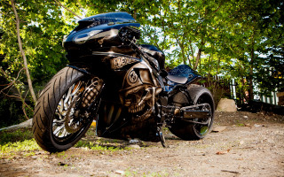 Motorcycle dirt road trees fence - in the foreground free wallpaper