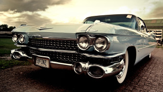 Classic car brickroad building cloudy - free retro wallpaper