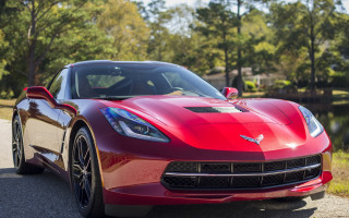Red sports car lake trees - a bow free wallpaper