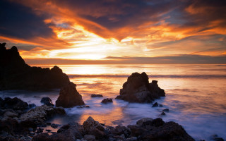 Sunset ocean rocks water clouds 3 - the foreground and a sky free wallpaper