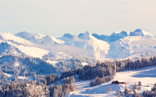 Snowy mountain cabin trees sky - a few snow covered mountains free wallpaper