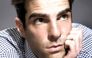 Man checkered shirt serious hand - his chin free wallpaper