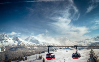 Ski lift two people mountains - a mountain side free wallpaper
