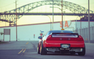 Red sports car bridge motion - a bridge and a bridge in the background free wallpaper