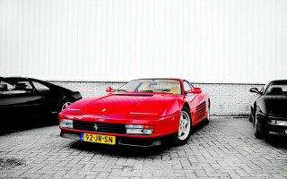 Red sports car brick road 16 - a black car free wallpaper