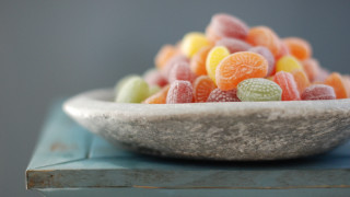 Bowl candies table blue cloth - a table top next free wallpaper