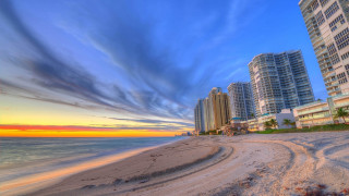 Beach sunset clouds cityscape bridge - a few building free wallpaper