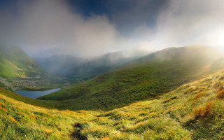 Grassy field lake mountains clouds 2 - a grassy field free wallpaper
