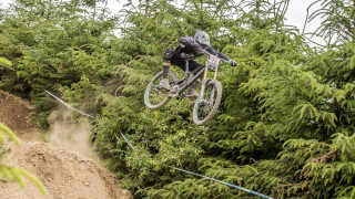 Man bike dirt hill forest - biomechanical free wallpaper