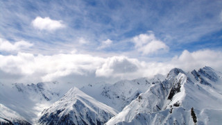 Snowy mountain range cloudy sky 4 - murata range free wallpaper