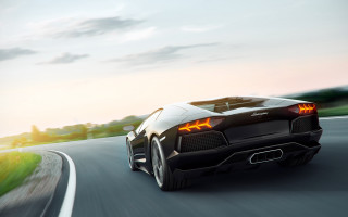 Black sports car sunset cloudy 2 - the headlight free wallpaper