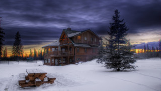 Snowy cabin dusk bridge trees - a sunset in the background free wallpaper