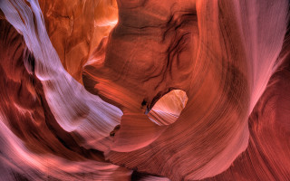 Narrow slot canyon rock hole - a rock wall free wallpaper