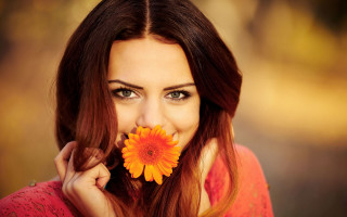 Woman smiling flower mouth holding 2 - her nose free wallpaper