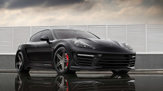 Black sports car wet road - a wet road free wallpaper