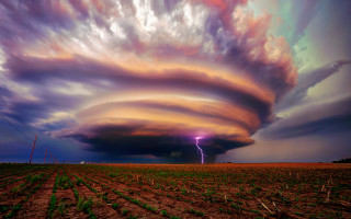 Clouds lightning field cityscape sunset - a large cloud free wallpaper