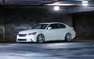 White car parking garage concrete - a parking garage next free wallpaper