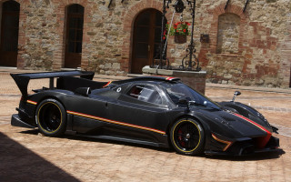 Black sports car brick wall 3 - spectacular free wallpaper