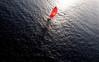 Red sailboat shoreline night sky - a shore line free wallpaper
