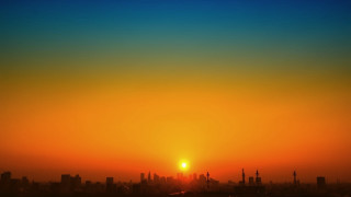 Sunset cityscape plane dusk silhouette - the sun setting free wallpaper