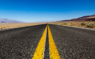 Long road mountains cityscape sky - the middle of it free wallpaper