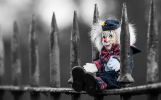 Clown doll fence hat scarf - a fence free wallpaper