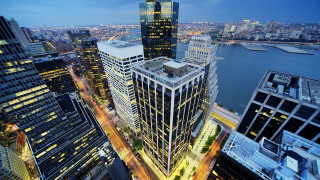 Cityscape tall buildings river night - institutional free wallpaper
