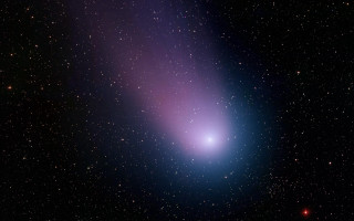 Bright blue object center dark - cosmic free wallpaper