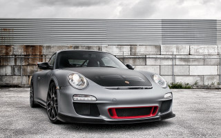 Grey sports car parked building 3 - a wall behind free wallpaper