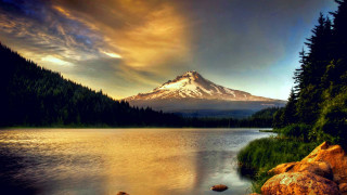 Mountain lake forest cloudy sky 15 - a forest in the foreground free wallpaper