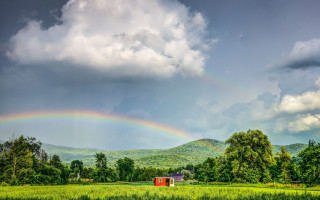 Rainbow greenfield redshed mountains nature - over a green field free wallpaper