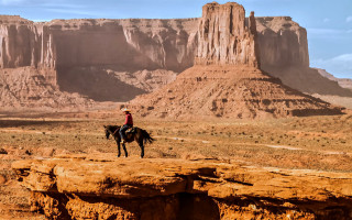 Desert horseman mountain canyon sunset - a man riding free wallpaper