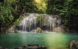Waterfall large rock green water - a large rock in the middle of it free wallpaper