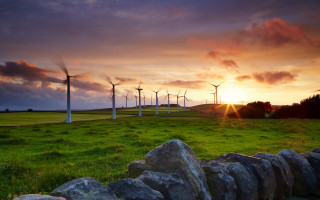 Sunset windmills field clouds horizon - a few cloud free wallpaper