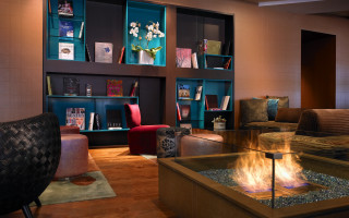 Living room firepit bookshelf chair - vibrant color scheme free wallpaper
