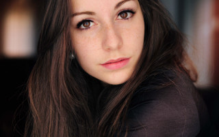 Woman long hair brown shirt 4 - free portrait wallpaper