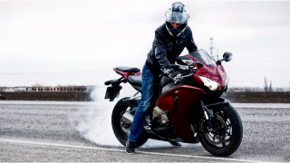 Man riding red motorcycle field - cybernetic free wallpaper