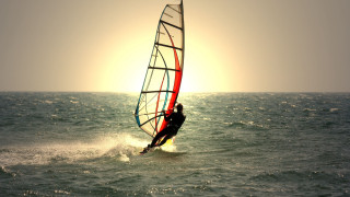 Surfing sail sunset beach water - a person riding free wallpaper