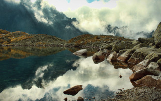 Mountain lake rocks water cloudy - rock and water free wallpaper