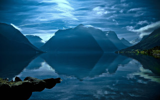 Mountain reflection lake sky clouds 2 - the water of a lake free wallpaper