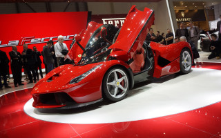 Red sports car showroom people - a showroom free wallpaper