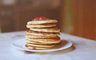 Pancakes strawberry plate knife fork - top of them free wallpaper
