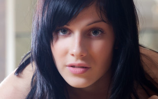 Woman black hair pink shirt - shaded free wallpaper
