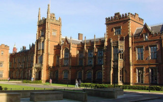 Large building clock tower architecture - front view free wallpaper