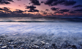 Sunset beach wave clouds mountain - rich moody colour free wallpaper