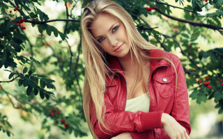 Woman red jacket posing under - a red jacket free wallpaper
