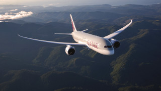 White airplane flying mountains red 2 - a red tail free wallpaper