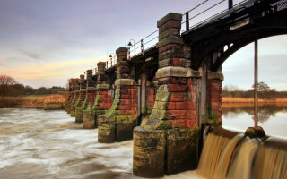 Bridge river waterfall brick pillars - alexander johnston free wallpaper